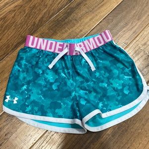 Girls blue camo Under Armour athletic shorts with purple waistband